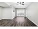 Bright living room with luxury vinyl plank flooring, ceiling fan, and natural light at 1250 Parkwood Circle Se # 1110, Atlanta, GA 30339