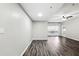 Bright and airy living room with luxury vinyl plank flooring and modern ceiling fan at 1250 Parkwood Circle Se # 1110, Atlanta, GA 30339