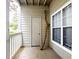 Covered patio area with closed storage and windows at 1250 Parkwood Circle Se # 1110, Atlanta, GA 30339