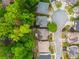 A birdseye shot of the property and nearby cul-de-sac surrounded by trees and landscaping at 2918 Arbor Creek Ln, Atlanta, GA 30340