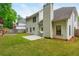 Spacious backyard featuring a green lawn, patio, and grilling area, ideal for entertaining and relaxation at 2918 Arbor Creek Ln, Atlanta, GA 30340