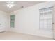 Bright bedroom with neutral carpet, ceiling fan, and natural light at 2918 Arbor Creek Ln, Atlanta, GA 30340