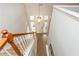 Bright entryway with front door with sidelights and staircase with wood railing at 2918 Arbor Creek Ln, Atlanta, GA 30340