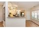 Well-lit kitchen with a breakfast bar and modern appliances at 2918 Arbor Creek Ln, Atlanta, GA 30340