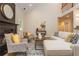 Bright living room featuring a fireplace, plush seating, and high ceilings at 2918 Arbor Creek Ln, Atlanta, GA 30340
