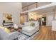 Open-concept living area with hardwood floors and access to the kitchen at 2918 Arbor Creek Ln, Atlanta, GA 30340