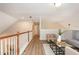 Cozy loft area with comfortable seating and wood floors at 2918 Arbor Creek Ln, Atlanta, GA 30340