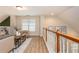 Comfortable loft area with seating, wood floors, and natural light at 2918 Arbor Creek Ln, Atlanta, GA 30340