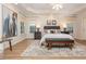 Large main bedroom showcasing a trey ceiling, neutral palette, and multiple windows at 2918 Arbor Creek Ln, Atlanta, GA 30340