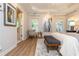 Tranquil main bedroom with a tray ceiling and private ensuite at 2918 Arbor Creek Ln, Atlanta, GA 30340
