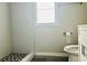 Bathroom featuring tiled walk-in shower, toilet, and modern sink at 2961 Stone Mountain St, Lithonia, GA 30058