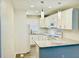 Updated kitchen with white cabinets, modern appliances, granite countertops, and recessed lighting at 2961 Stone Mountain St, Lithonia, GA 30058