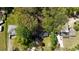 Aerial view of the home showing mature trees, landscape, and the surrounding neighborhood at 343 Ridge Pine Dr, Canton, GA 30114