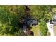 Aerial view of the home showing mature trees, landscape, and the surrounding neighborhood at 343 Ridge Pine Dr, Canton, GA 30114