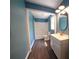 Stylish bathroom with a shower over tub, vanity, and neutral color palette at 343 Ridge Pine Dr, Canton, GA 30114