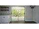 Bright dining area with sliding glass doors leading to the outdoor space and modern decor at 343 Ridge Pine Dr, Canton, GA 30114