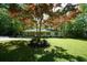 Inviting home with a lush green lawn and mature trees at 343 Ridge Pine Dr, Canton, GA 30114