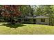 Lovely home featuring a well-maintained lawn and mature trees at 343 Ridge Pine Dr, Canton, GA 30114