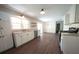 Bright kitchen with white cabinets and views of the backyard at 343 Ridge Pine Dr, Canton, GA 30114