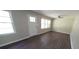 Bright living room with windows and sleek flooring at 343 Ridge Pine Dr, Canton, GA 30114