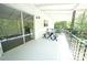 Large back porch with a picnic table overlooking the backyard and wooded area at 343 Ridge Pine Dr, Canton, GA 30114