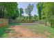 Fenced backyard showcasing a spacious grassy area and plenty of space for outdoor activities at 3563 Castleridge Dr, Tucker, GA 30084