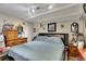 Cozy bedroom with hardwood floors, ceiling fan, and neutral wall colors at 3563 Castleridge Dr, Tucker, GA 30084