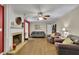 Spacious living room with hardwood floors, fireplace and lots of natural light at 3563 Castleridge Dr, Tucker, GA 30084