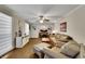 Comfortable living room boasting wood floors, natural light and open layout at 3563 Castleridge Dr, Tucker, GA 30084