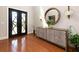 Inviting foyer with hardwood floors, stylish console table, and elegant decor, perfect for welcoming guests at 4125 Barnes Meadow Sw Rd, Smyrna, GA 30082