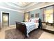 Beautiful bedroom features trey ceiling, decorative curtains, lamps and furnishings at 4125 Barnes Meadow Sw Rd, Smyrna, GA 30082