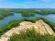 Panoramic aerial view of construction within the Great Sky community, next to a serene lake at 159 Sunshower Rdg, Canton, GA 30114