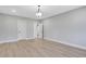 Spacious bedroom with hardwood floors, natural light, and neutral color palette at 159 Sunshower Rdg, Canton, GA 30114