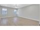 Bright bedroom with hardwood floors, large windows, and recessed lighting create a peaceful retreat at 159 Sunshower Rdg, Canton, GA 30114