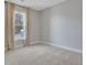 Bedroom with neutral paint, plush carpet, and a window with light curtains at 159 Sunshower Rdg, Canton, GA 30114