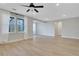 Spacious living room with ceiling fan, recessed lighting, and large windows offering views at 159 Sunshower Rdg, Canton, GA 30114