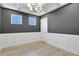 Office space features modern lighting, wainscotting details, and neutral paint at 159 Sunshower Rdg, Canton, GA 30114
