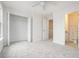 Carpeted bedroom featuring attached bathroom and a spacious walk-in closet at 277 Ralph David Abernathy Blvd, Atlanta, GA 30312