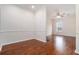 A brightly lit dining room with hardwood floors and a ceiling fan at 277 Ralph David Abernathy Blvd, Atlanta, GA 30312