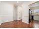 Bright dining area showcasing kitchen with white cabinets and stainless appliances at 277 Ralph David Abernathy Blvd, Atlanta, GA 30312