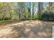 Large backyard featuring grass and a view of trees at 2827 Overlook Ne Trce, Atlanta, GA 30324