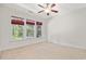 Bedroom featuring neutral carpet and large windows at 2827 Overlook Ne Trce, Atlanta, GA 30324