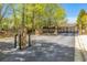 Gated community entrance with stone pillars and decorative iron gates at 2827 Overlook Ne Trce, Atlanta, GA 30324