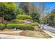 Overlook at Lenox community sign is surrounded by lush greenery and landscaping at 2827 Overlook Ne Trce, Atlanta, GA 30324
