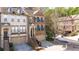 Attractive townhome with brick exterior, private garage, and inviting curb appeal at 2827 Overlook Ne Trce, Atlanta, GA 30324