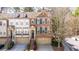 Beautiful townhome exterior with well-kept landscaping, garage, and brick accents at 2827 Overlook Ne Trce, Atlanta, GA 30324