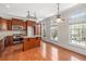 Well-appointed kitchen with wood cabinets, stainless steel appliances, granite countertops, and island at 2827 Overlook Ne Trce, Atlanta, GA 30324