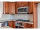 Close-up of modern kitchen with stainless steel appliances, granite countertops, and ample cabinet space at 2827 Overlook Ne Trce, Atlanta, GA 30324