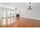 Bright and airy living room with hardwood floors, fireplace, and large windows at 2827 Overlook Ne Trce, Atlanta, GA 30324