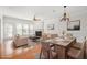 Living room featuring fireplace, hardwood floors and ample seating at 2827 Overlook Ne Trce, Atlanta, GA 30324